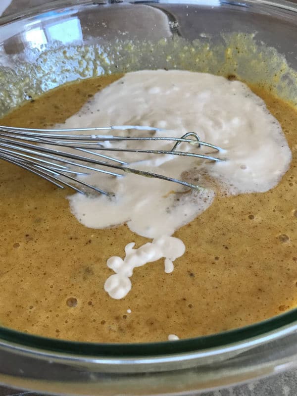 A close up of a bowl with mixture