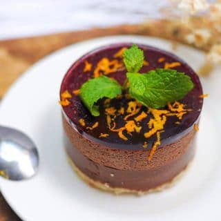 A close up of a piece of cake on a plate, with Mint and Mousse