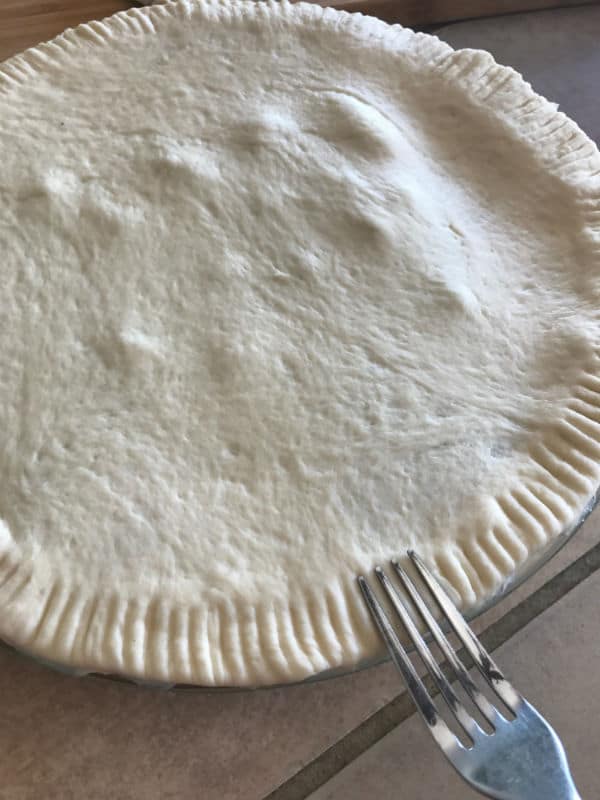 A photo showing a step towards making a shawarma pot dough