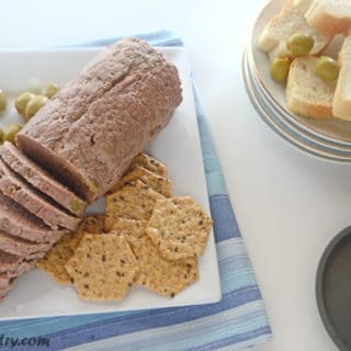 A tray of food on a plate, with corned Beef slices