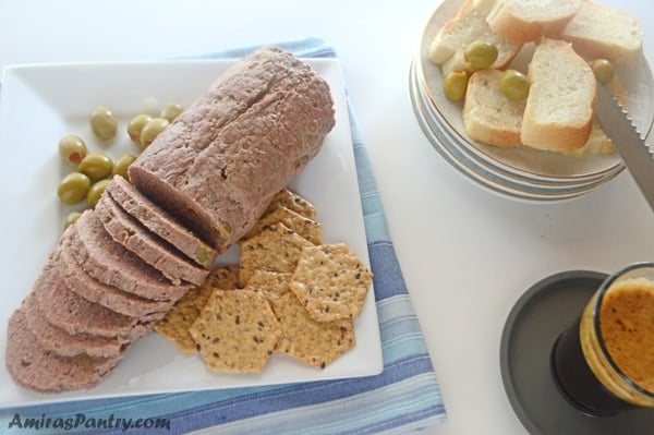 A tray of food on a plate, with Corned Beef and Cheese