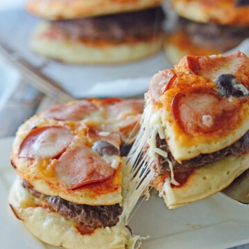 A slice of pizza burger on a plate