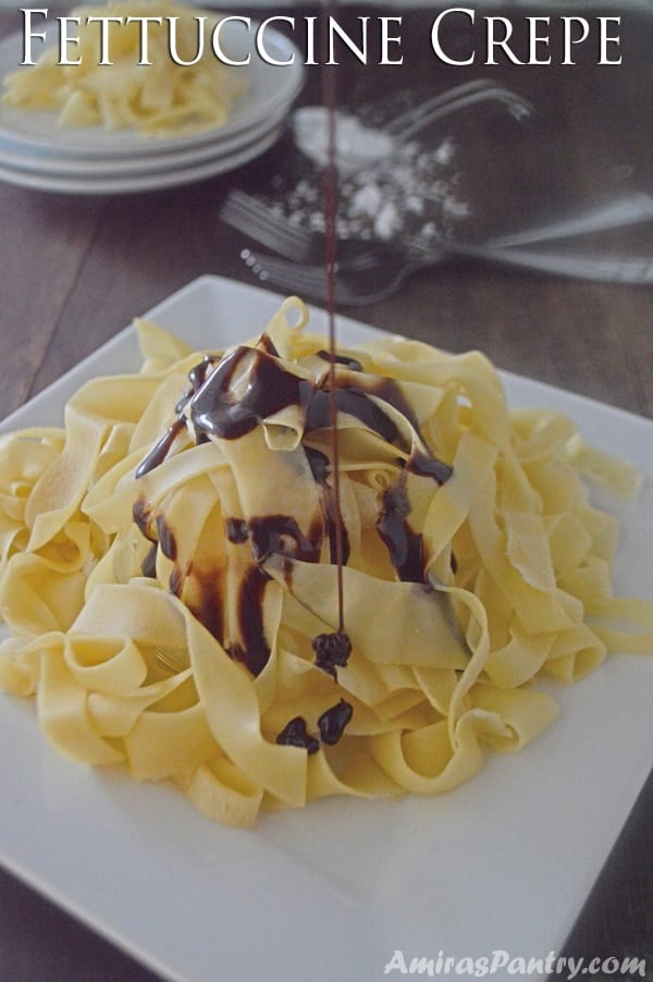 A close up of food on a plate, with Fettuccine