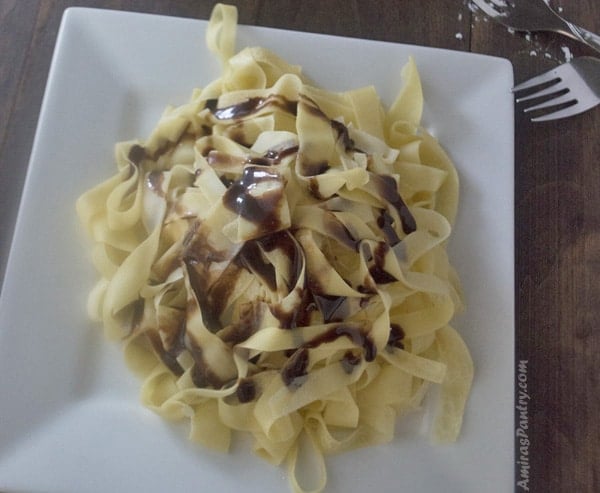 A close up of food on a plate, with Fettuccine