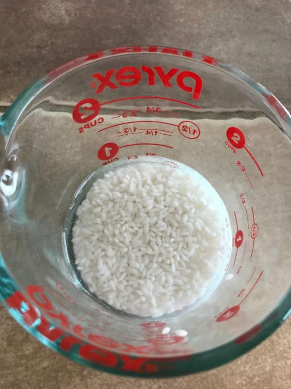 A glass jar with rice
