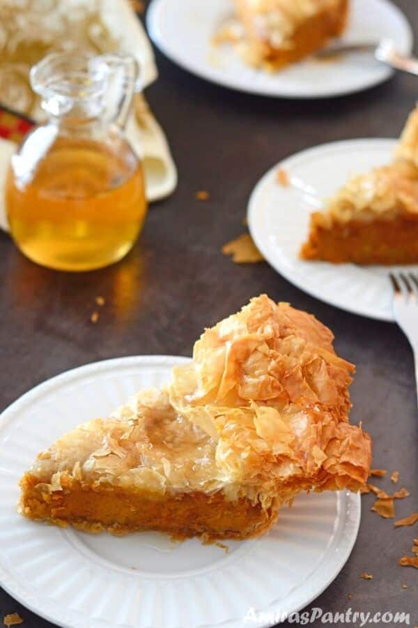 A close up of pumpkin phyllo pie piece on a plate