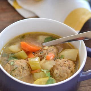 A bowl of food, with Turkey balls and Soup