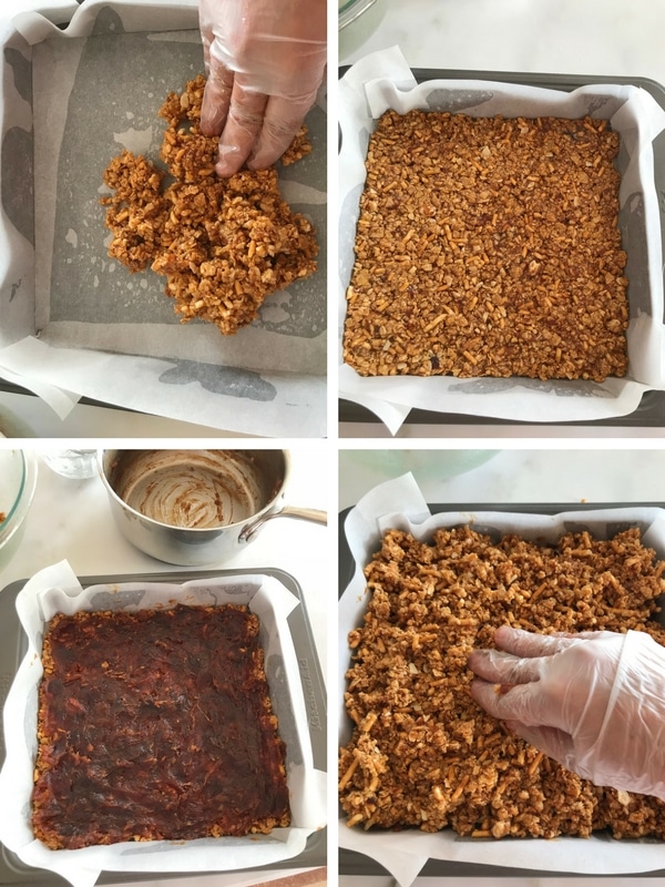 assembling the breakfast squares by pressing half the mixture then spread date pate then the rest of the mixture.