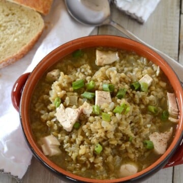 A bowl of food on a table, with Freekeh Soup