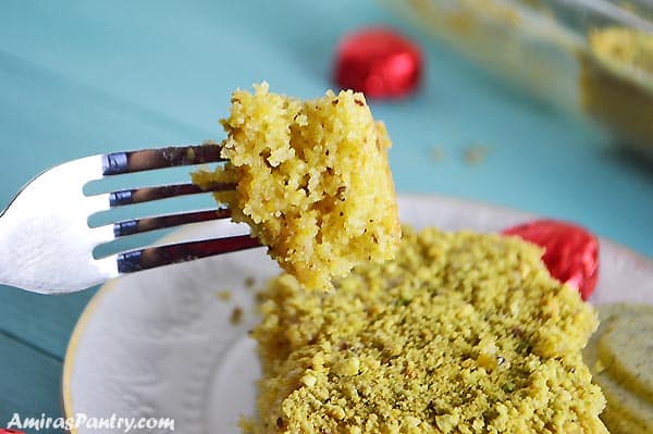 A close up of a pistachio semolina cake