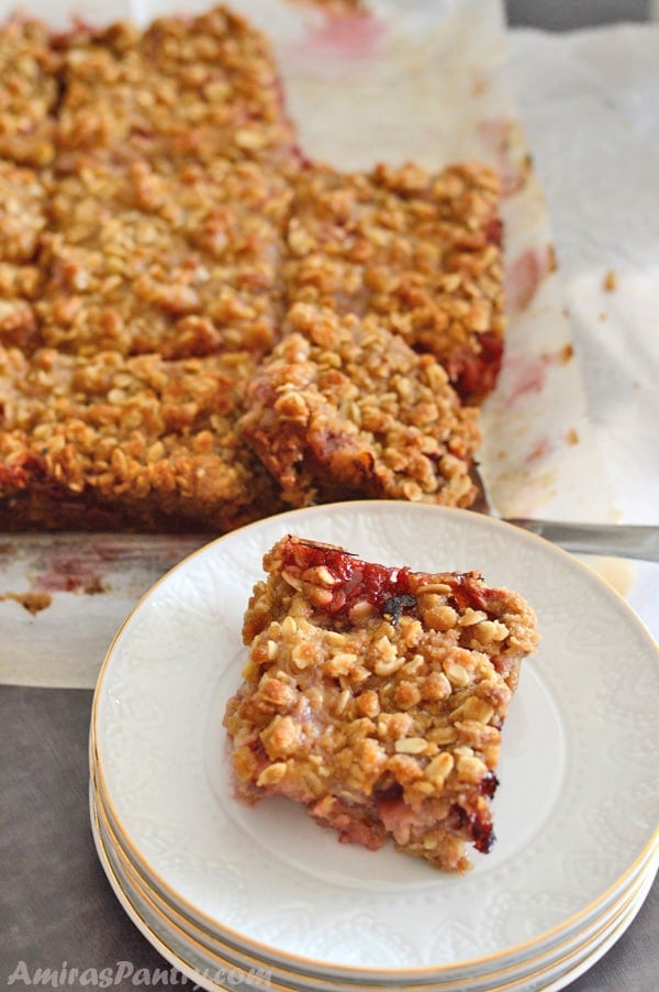 A plate with crumbled rhubarb bars