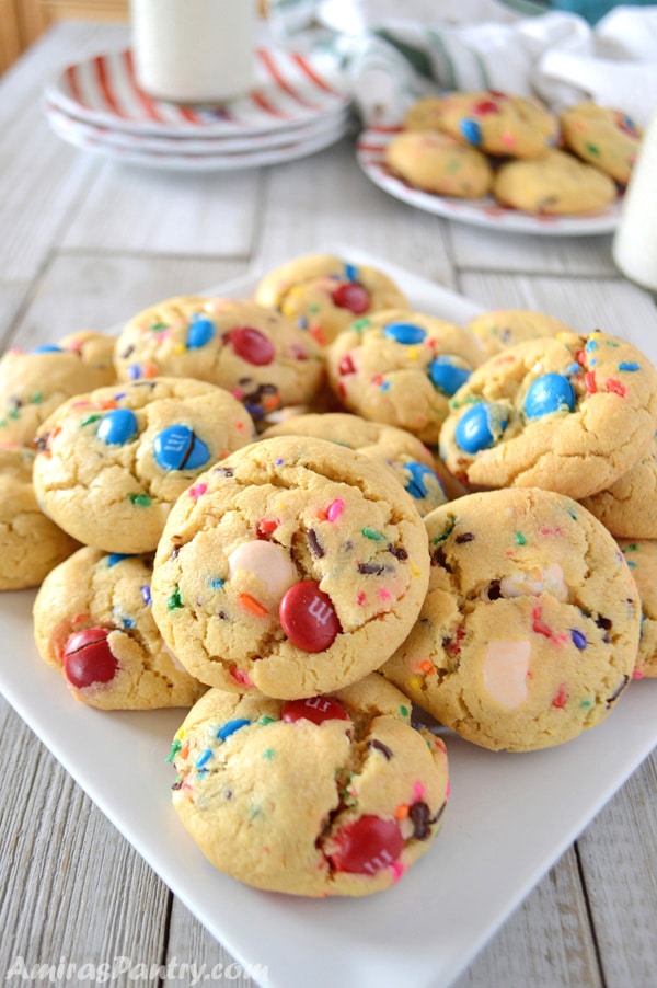 A close up of cookies made with M&M on a plate