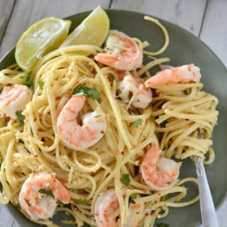 A dish is filled with food, with Shrimp Scampi and Pasta