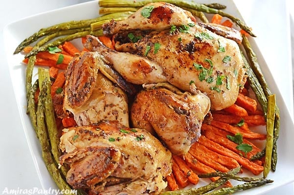 A plate of food with chicken and vegetables
