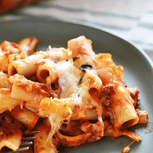 A close up of a plate of food, with baked Ziti pasta