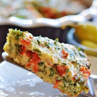 A close up of a slice of frittata