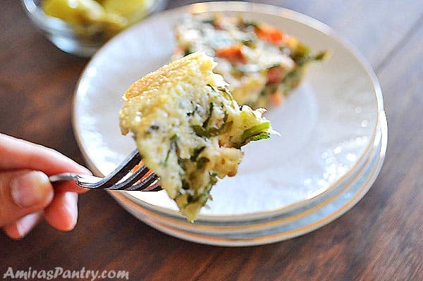 A close up of a plate of food with with Frittata and Egg