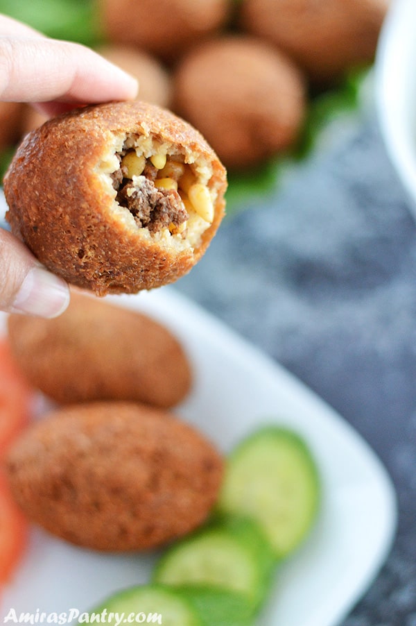 A close up of food on a plate, with Kibbeh