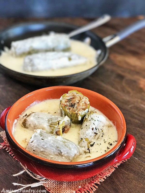 A bowl of food on a plate, with Zucchini and Yogurt