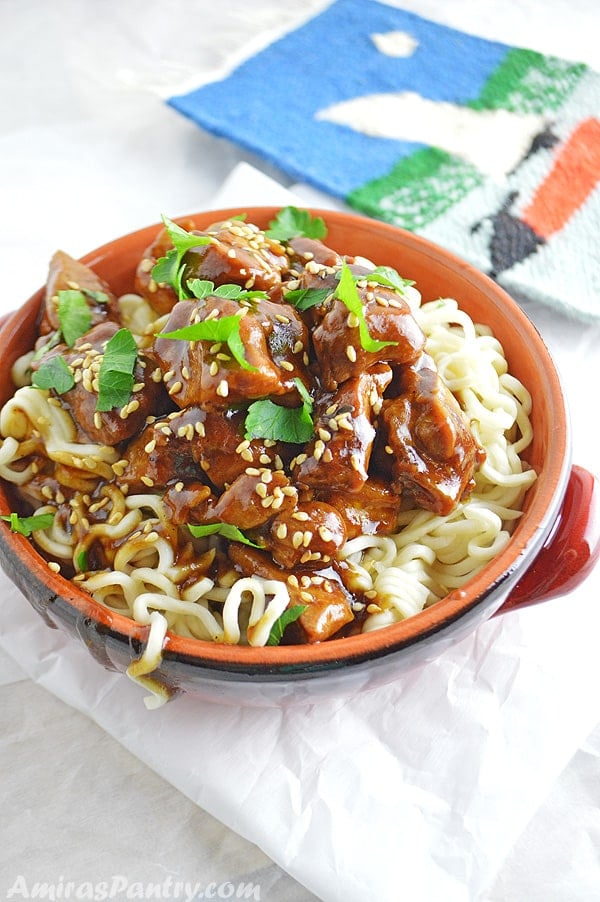 A close up of a plate of food, with Tamarind Chicken and pasta