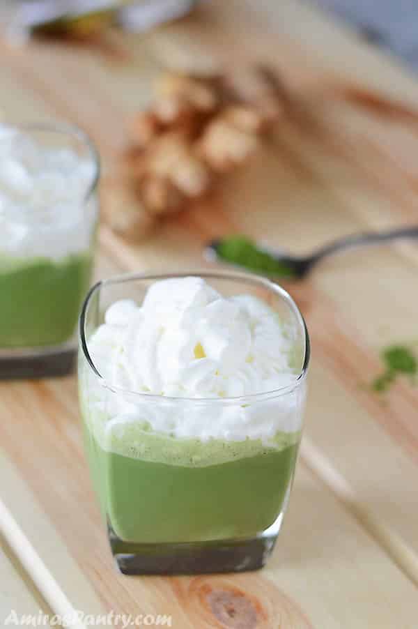 A glass of Matcha smoothie drink on a table