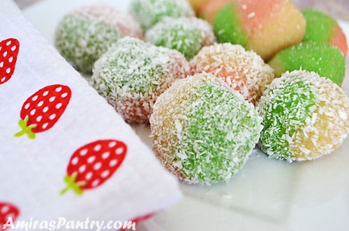 A close up of Tunisian colored dessert balls