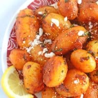 A plate of food, with feta and Potato