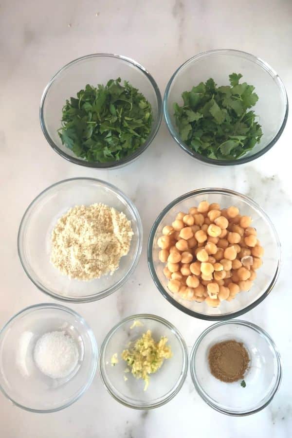 A photo showing ingredients for making falafel with chickpeas