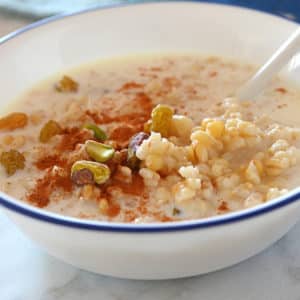 A bowl of wheat berries with milk