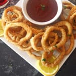 A close up of fried onions on a table