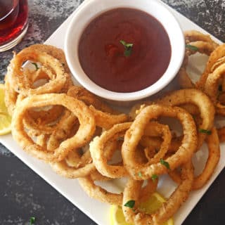 A close up of fried onions on a table