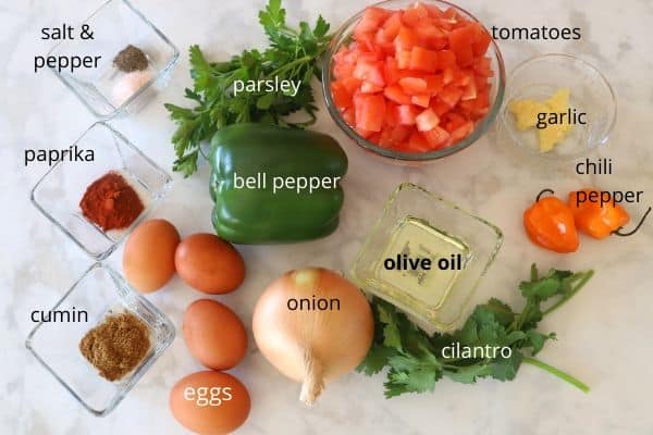 Ingredients on a table for making Shakshuka