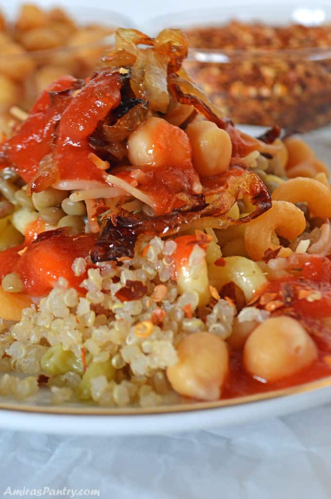 Best quinoa recipe -3 A pile of koshari made with quinoa placed on a white plate
