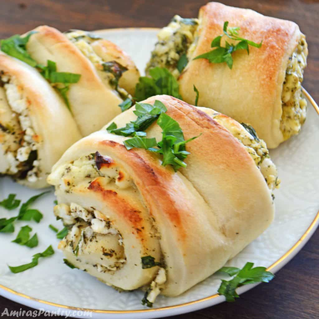 fatayer placed on a white serving plate and garnished with chopped parsley.