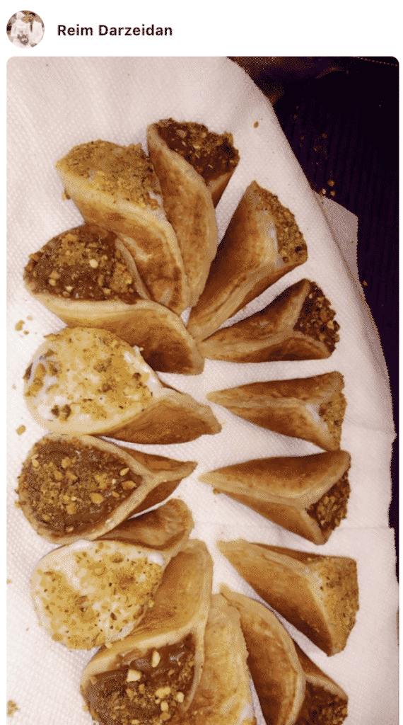 A close up of food, with stuffed Qatayef made by a fan