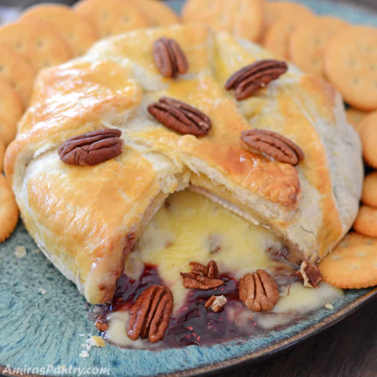A photo showing baked brie in puff pastry