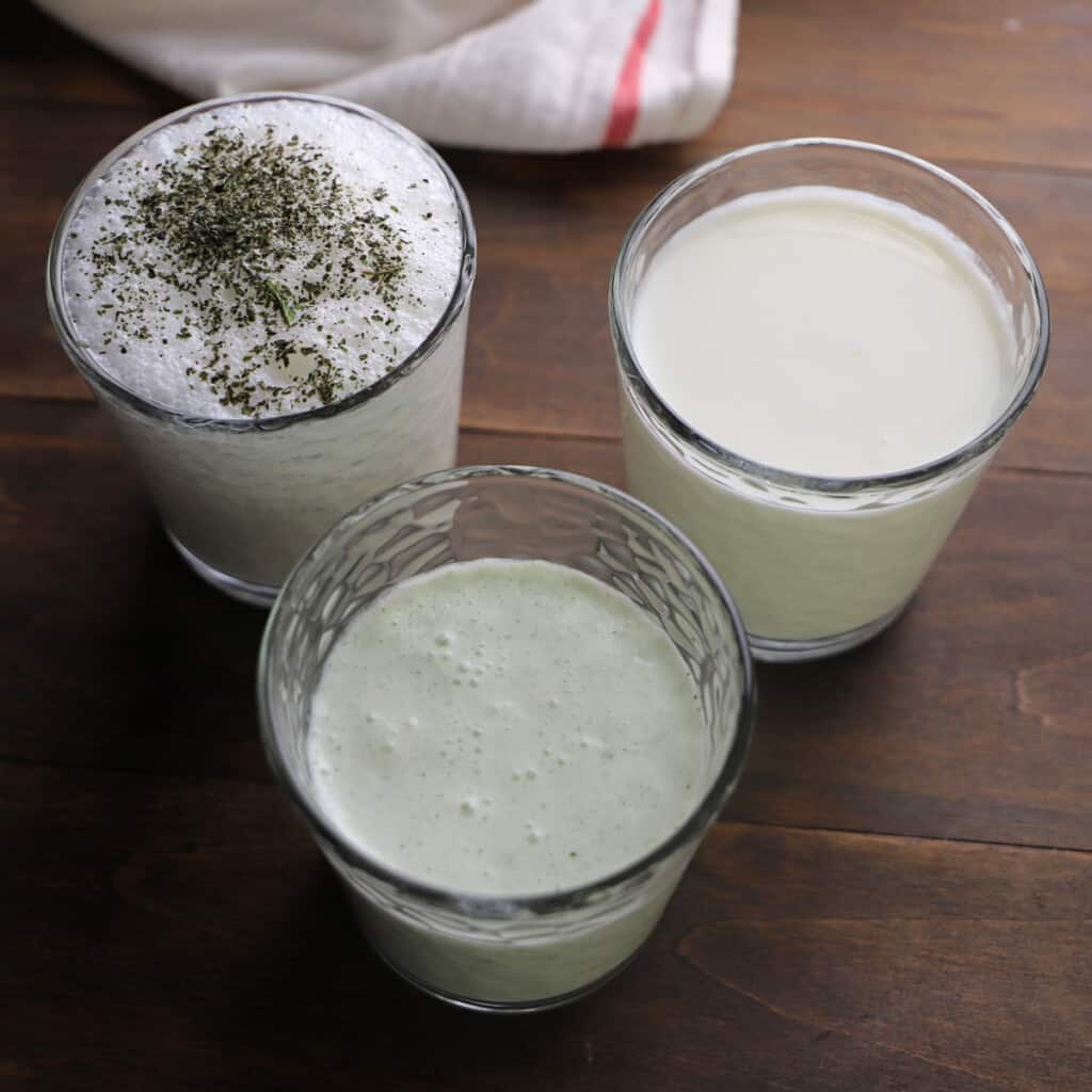 Three cups showing three different ways to serve Ayran.