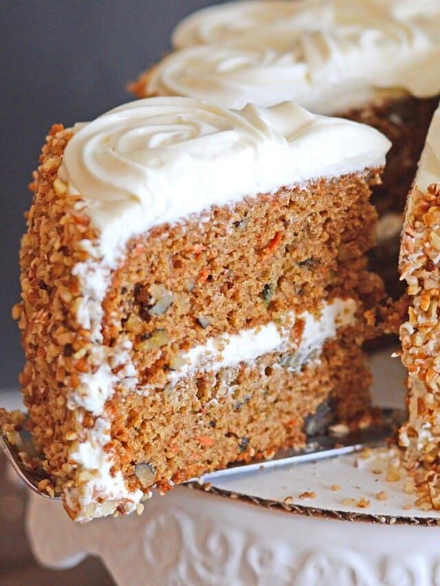 An image showing a slice of carrot cake pulled out.