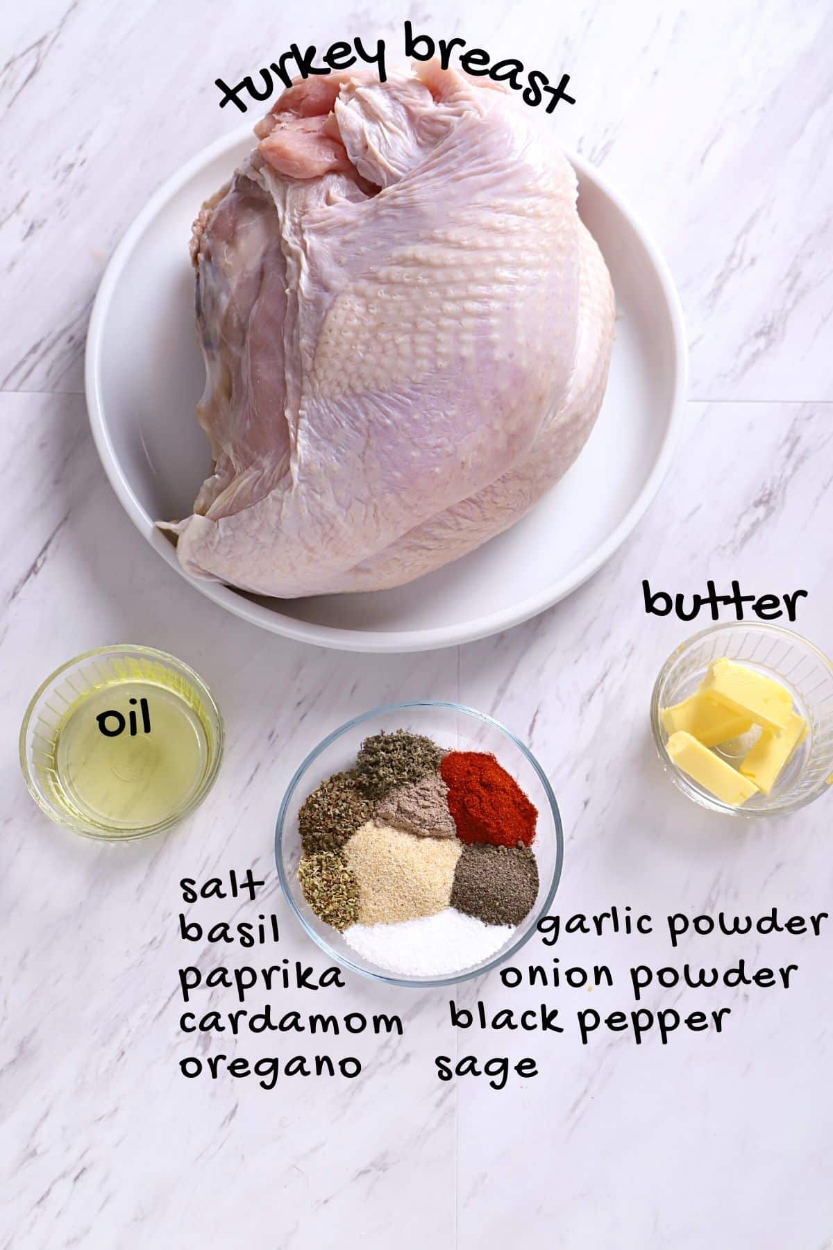 air fryer turkey breast ingredients placed on a white marble surface.