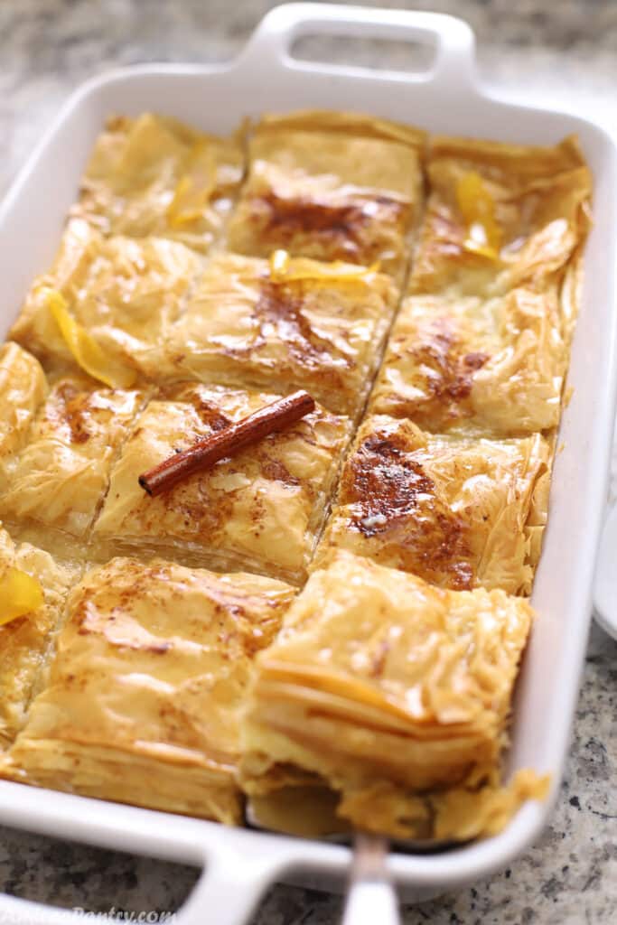 Galaktoboureko in a white oven dish.