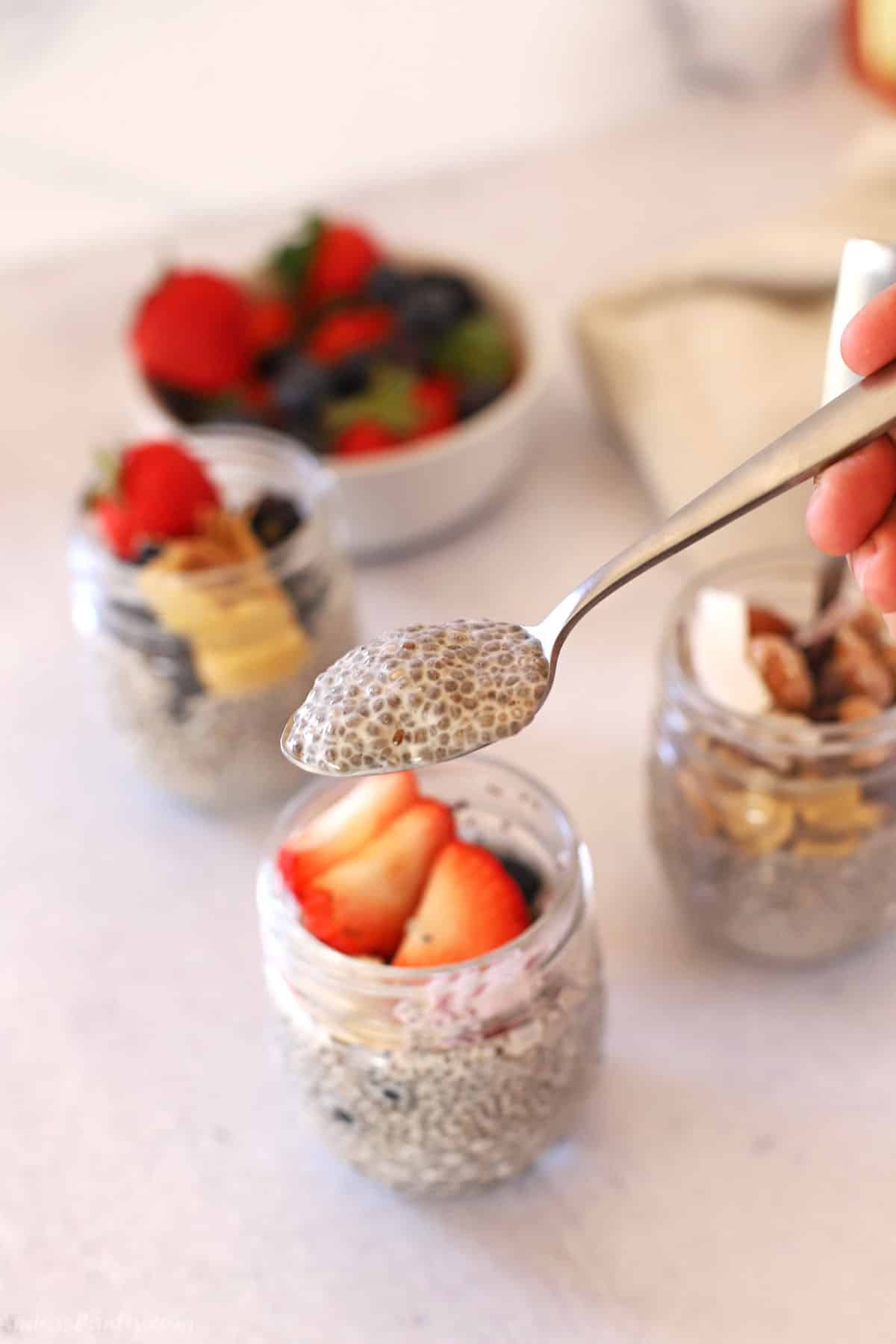 A spoon with some chia pudding to show texture.