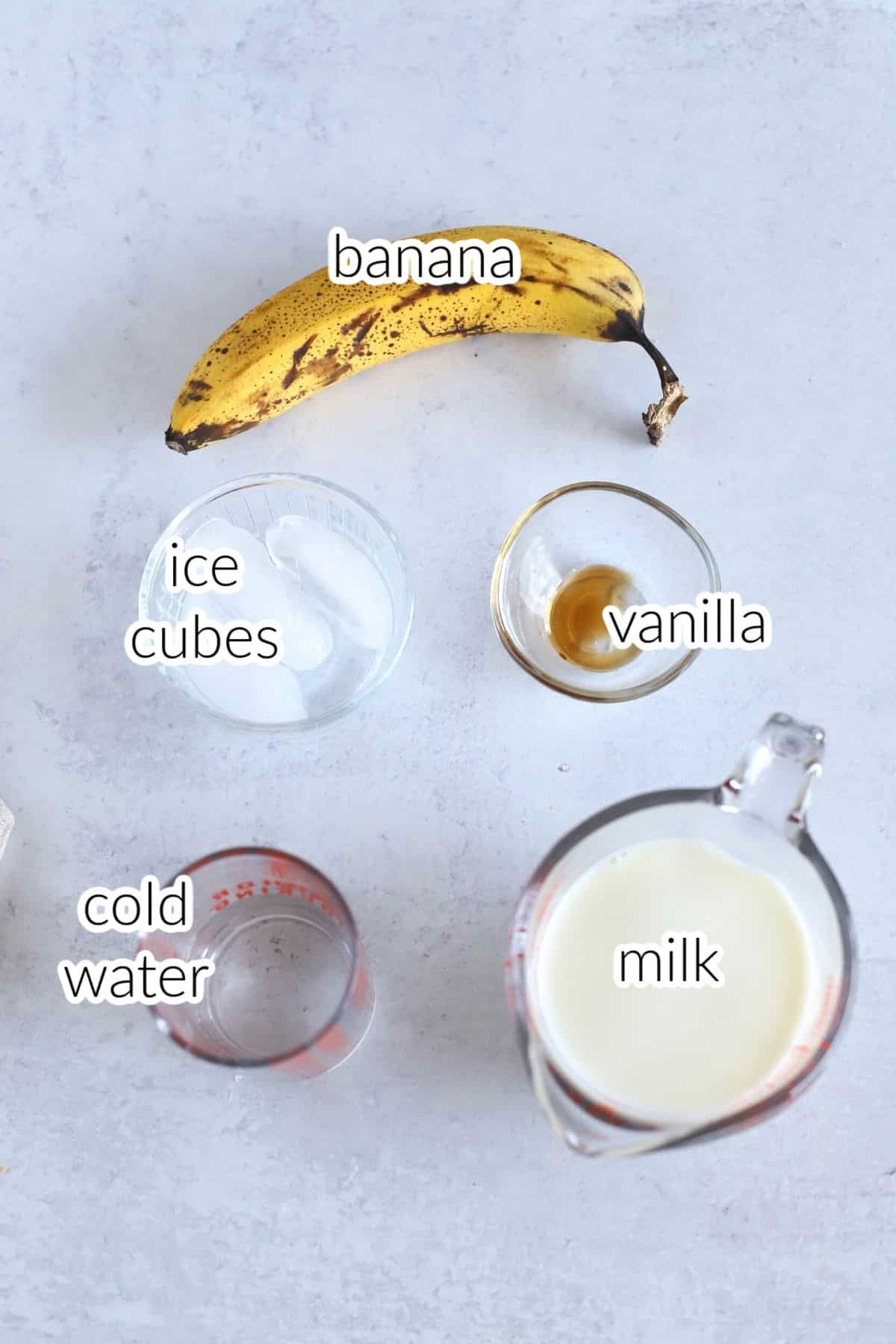 Banana milk ingredients on a countertop.