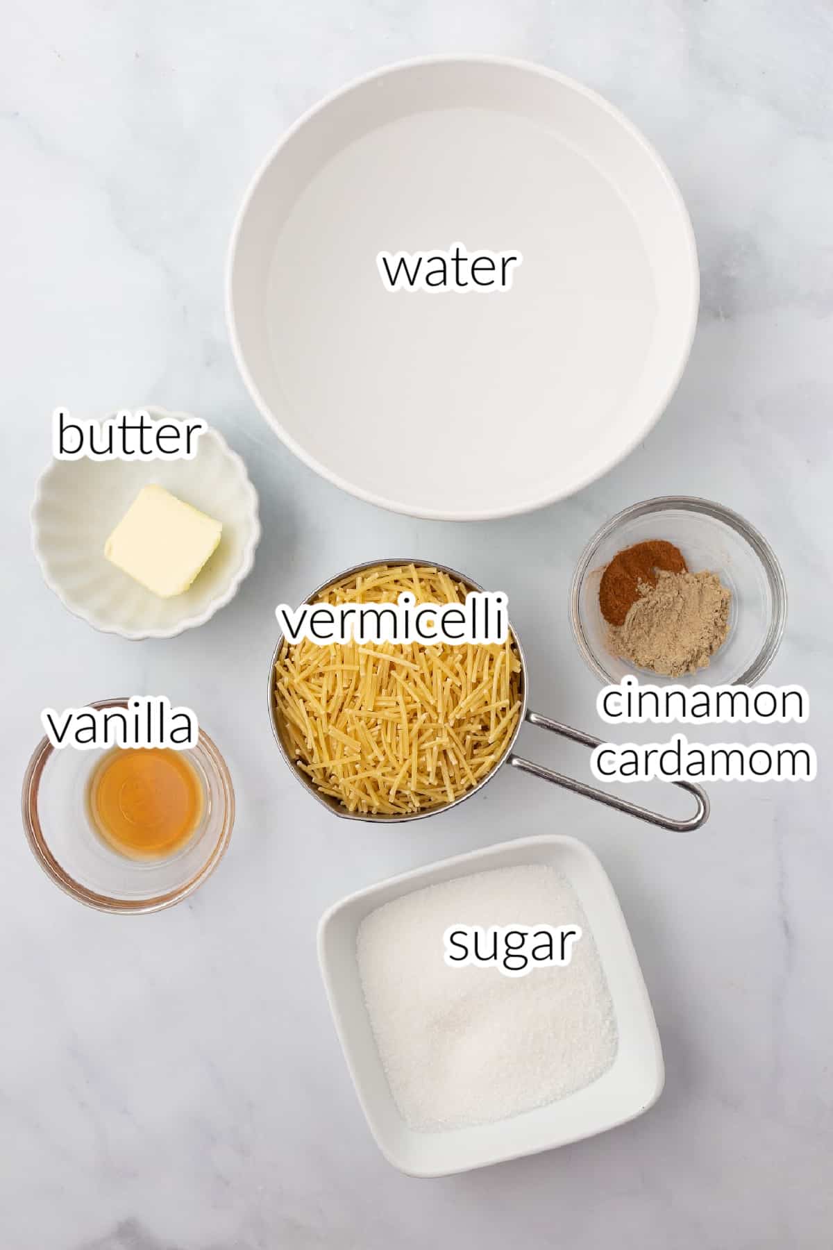 Recipe ingredients on a marble table.