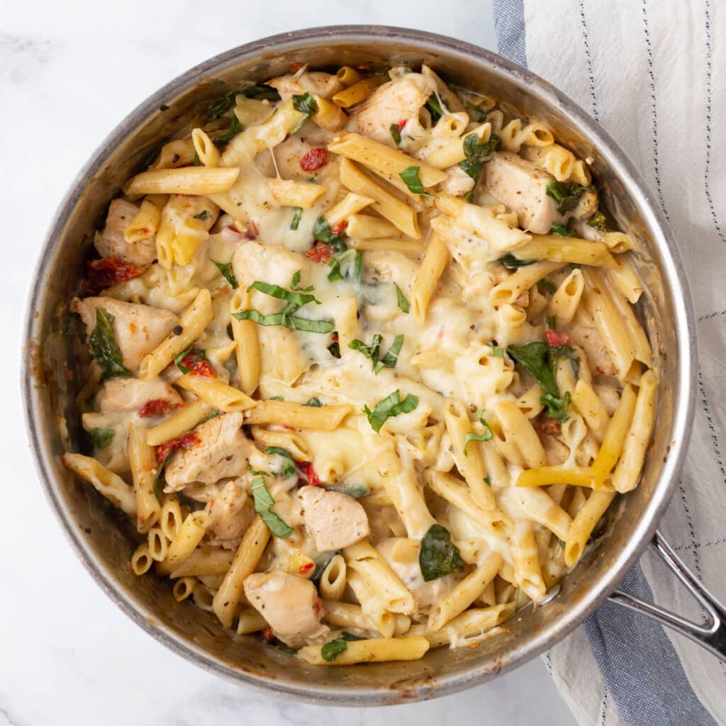 Creamy Tuscan Chicken Pasta Easy One Pot Recipe - Amira's Pantry