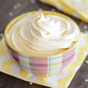 Marshmallow frosting in a pink bowl.