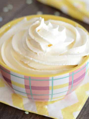 Marshmallow frosting in a pink bowl.