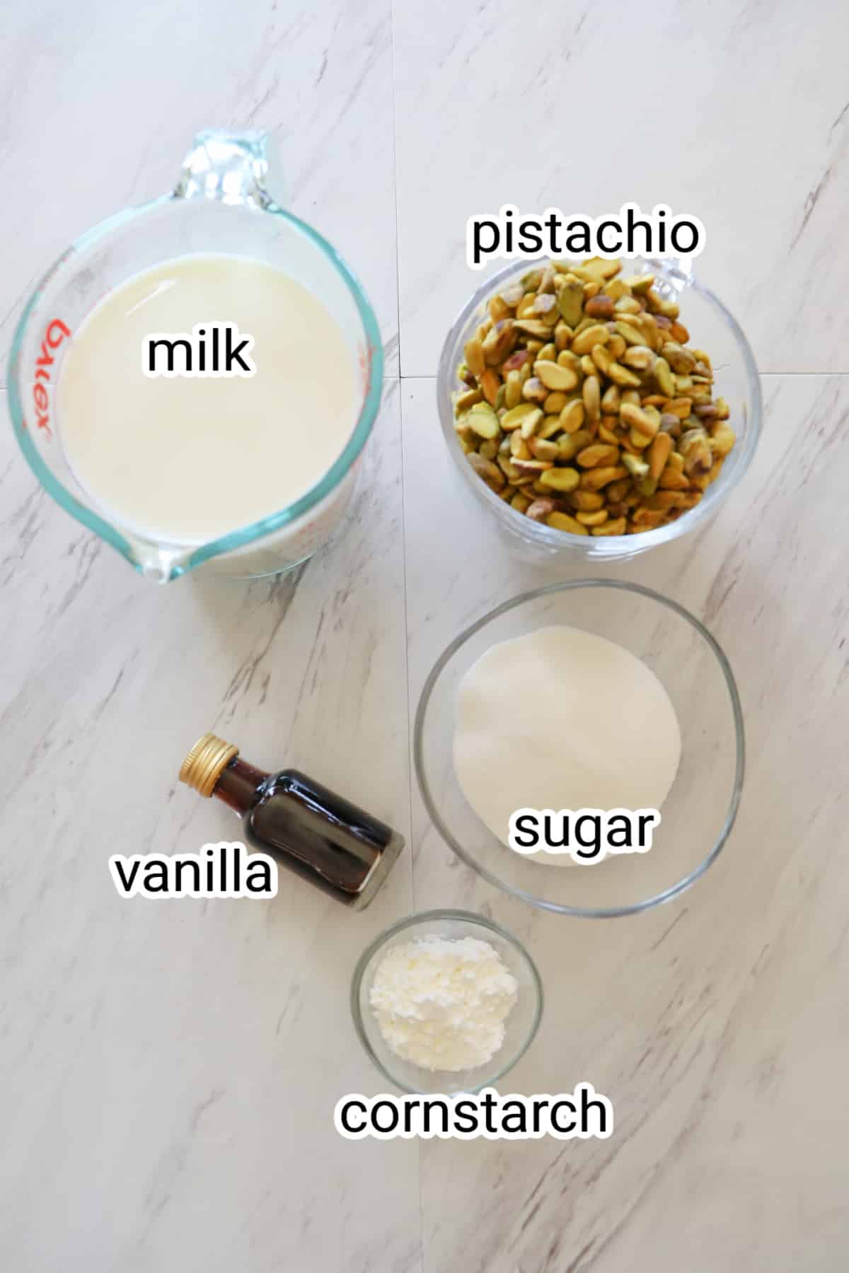 Recipe ingredients on a white counter.