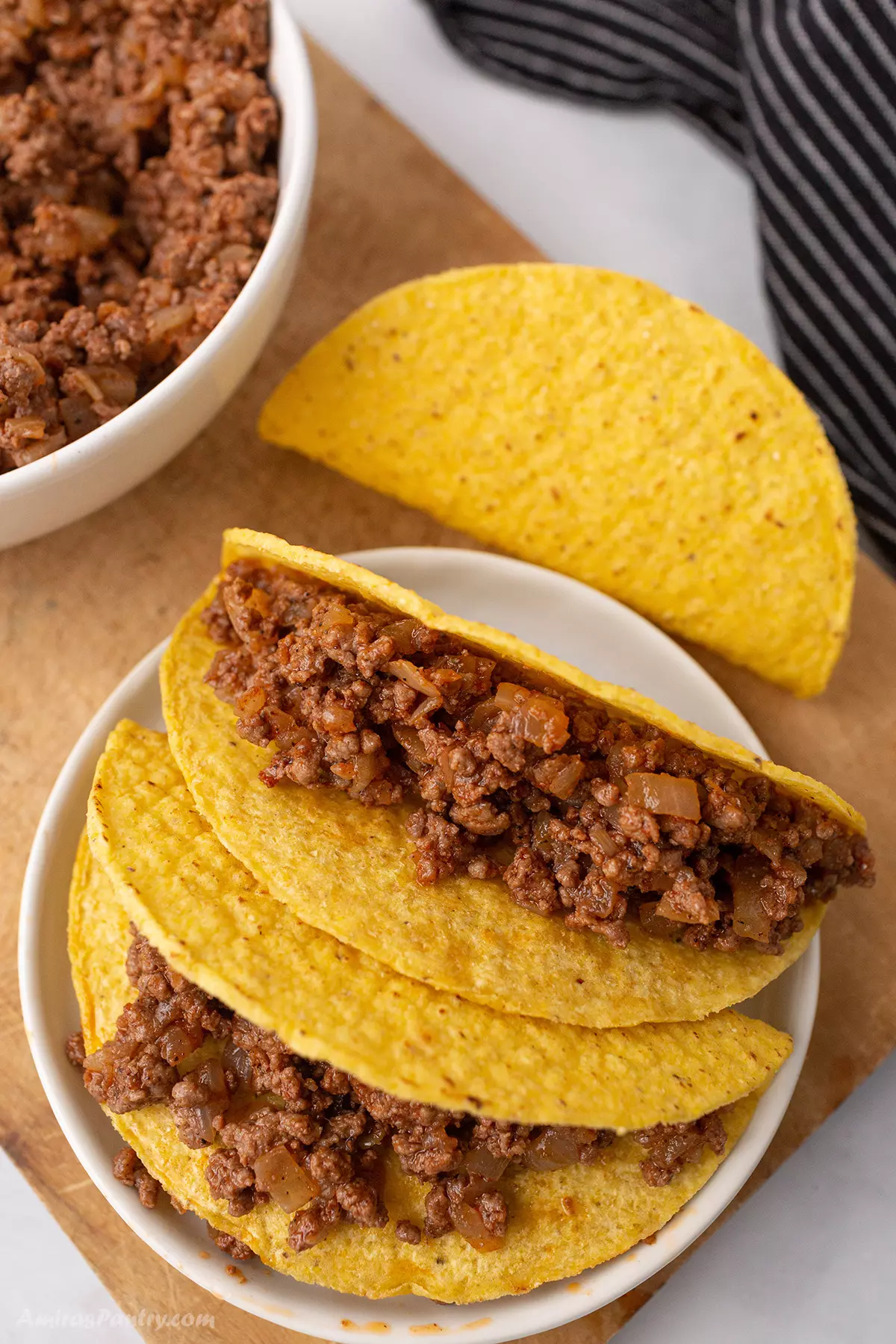 Taco shells with ground beef mixture.