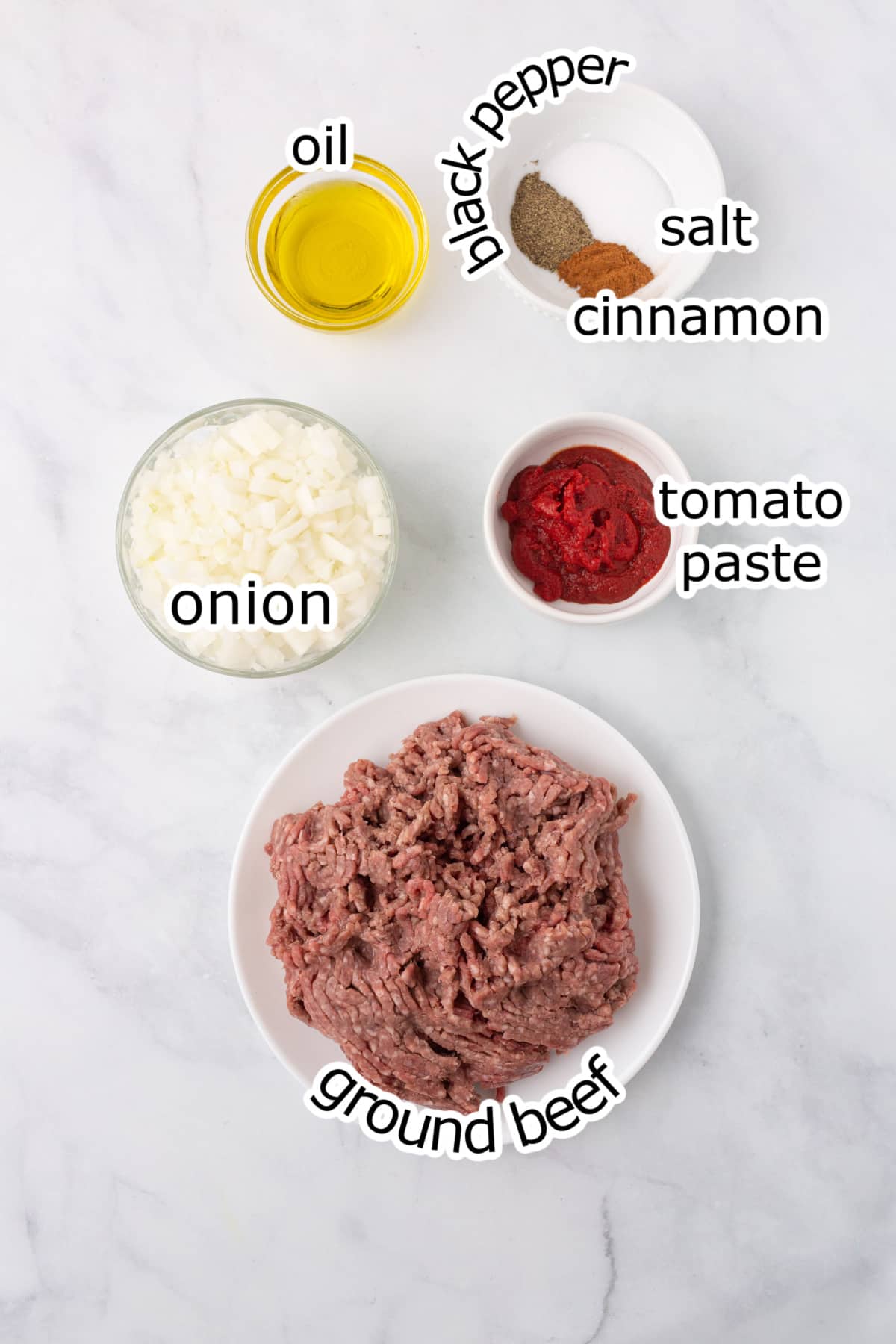 Ingredients for this recipe on a marble surface.