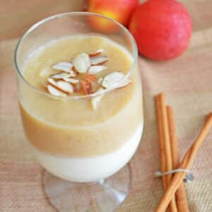 A cup with apple and milk pudding.